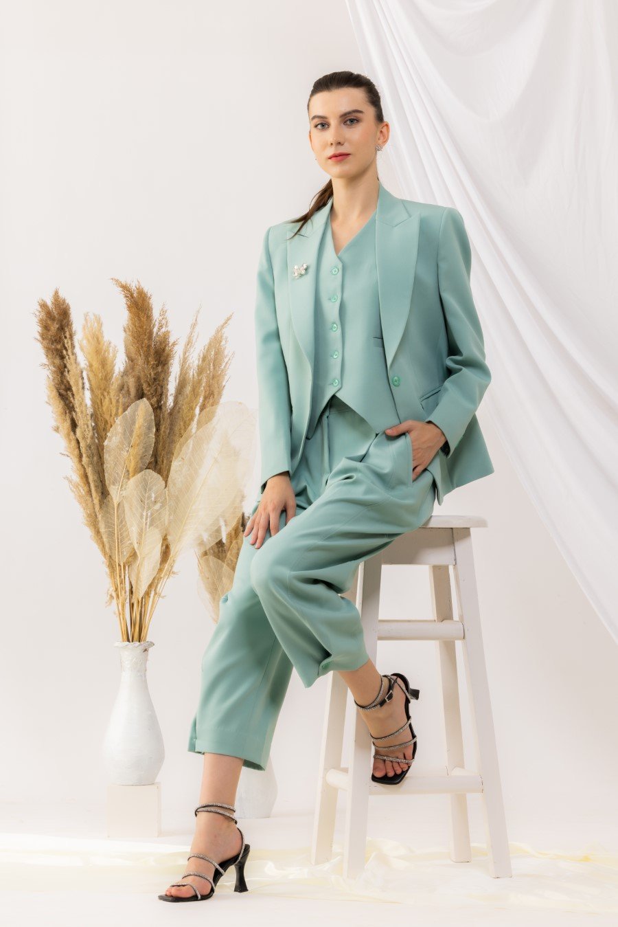 Sea Green Single Button Blazer With Flap Side Pockets Features with a Brooch